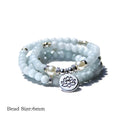 A women's vintage bracelet made of natural stone featuring a lotus geometry design.