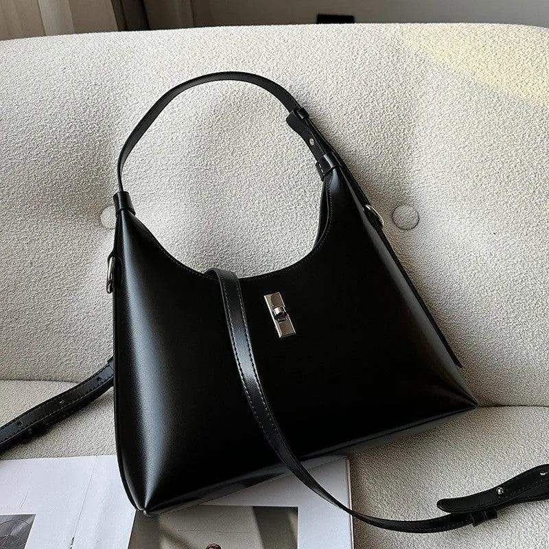 Genuine leather crossbody shoulder bag with dumpling shape and sandwich pocket design
