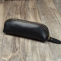 Genuine cowhide leather pencil case with zipper closure in square design measuring 18cm
