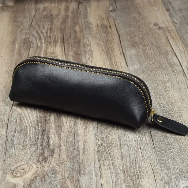 Genuine cowhide leather pencil case with zipper closure in square design measuring 18cm