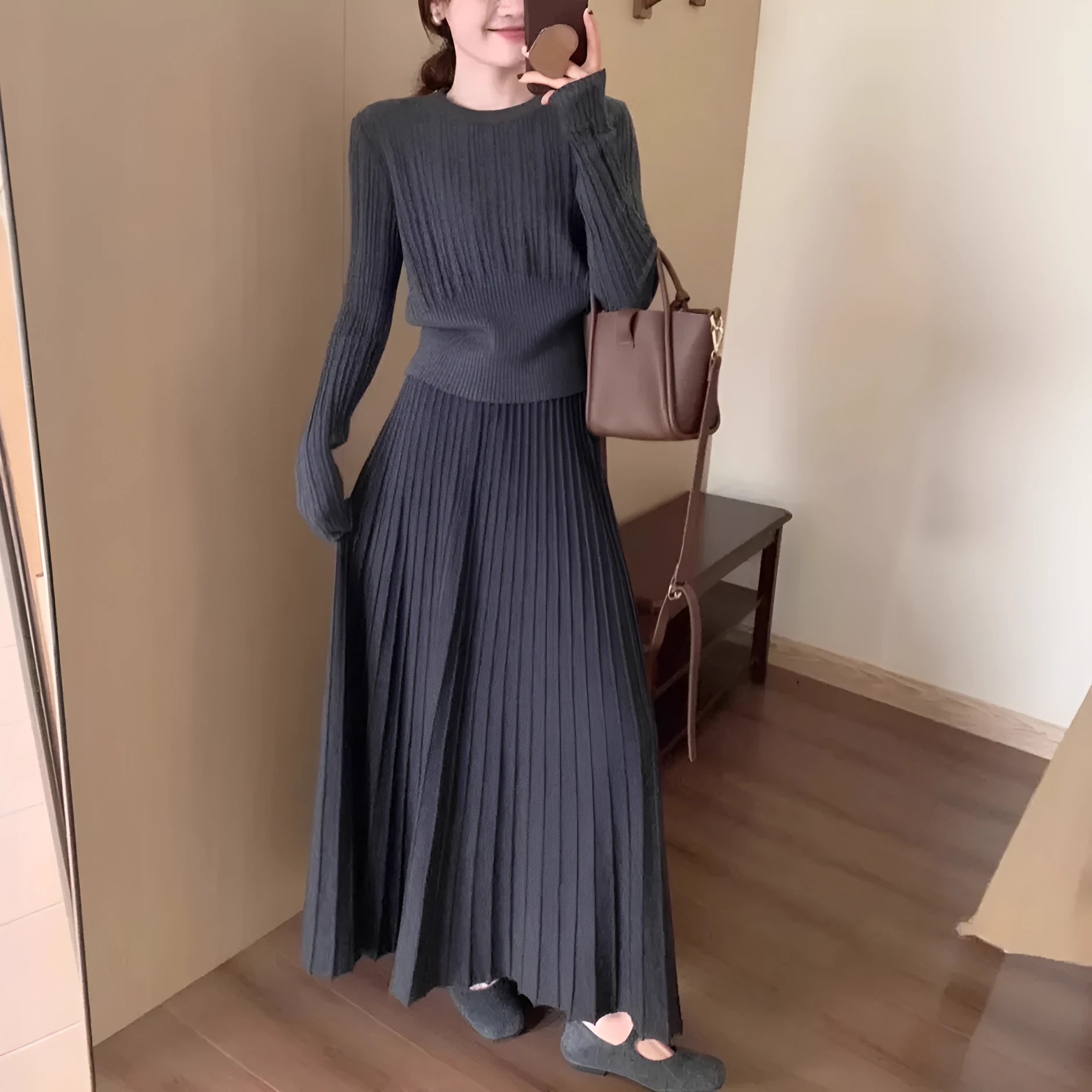 Dark grey knitted long dress suit set with sweater, skirt, and 3D ethnic pattern.