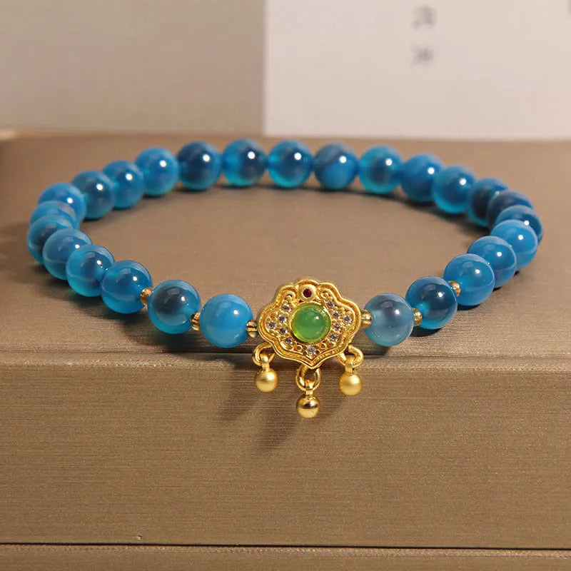 Women's blue sugar heart agate crystal pendant bracelet with safety lock clasp and rhinestone decorative elements