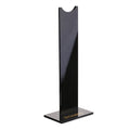 Black detachable head-mounted gaming headset bracket stand on a desk