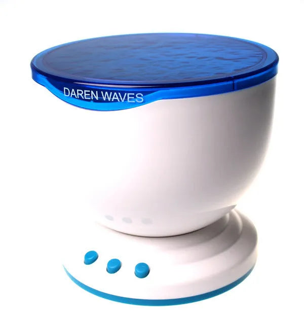Blue stationary ocean projection lamp with DLP technology on a surface.