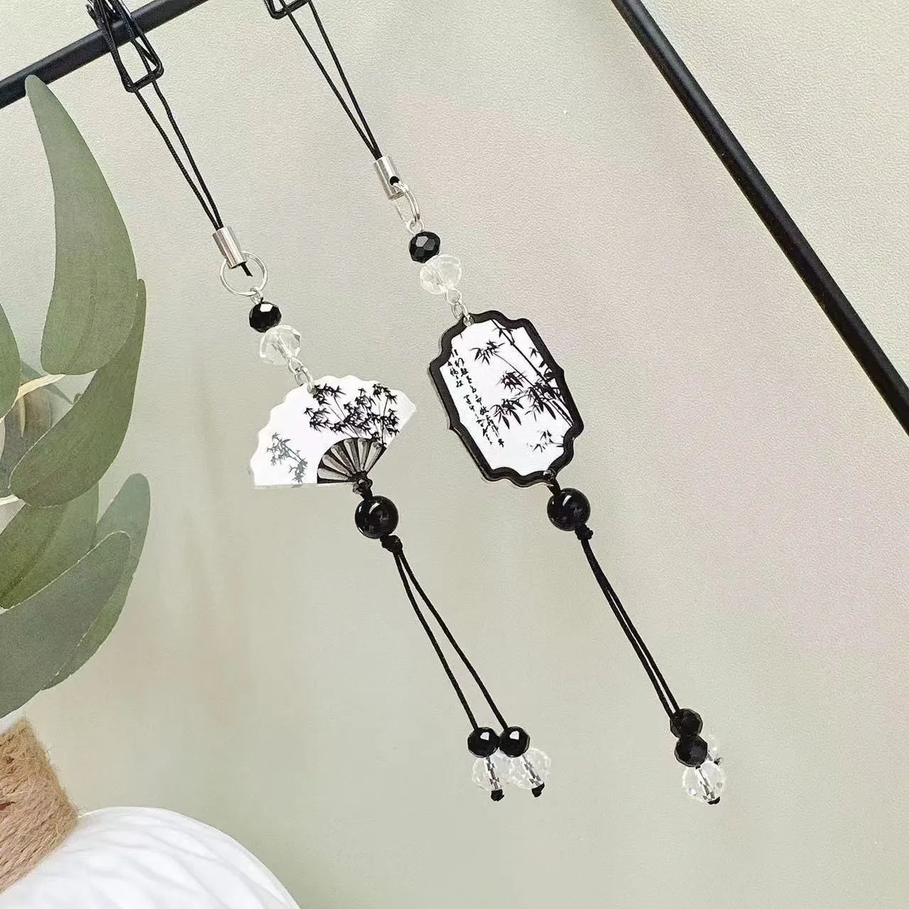 Guofeng style bead pendant keychain with plants and flowers pattern in baked varnish finish.