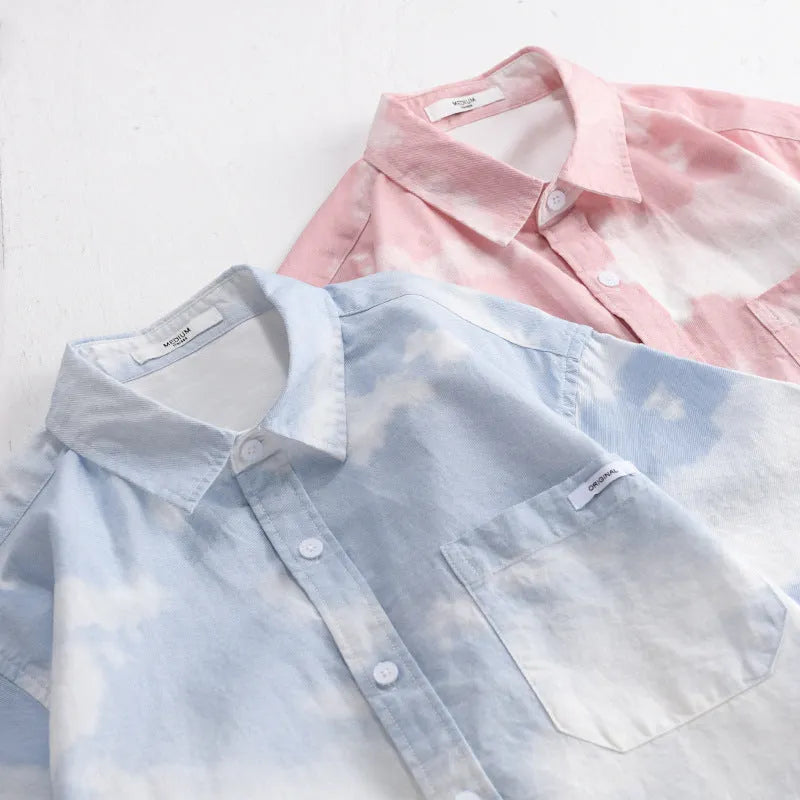 Men's light pink pure cotton short-sleeve shirt with loose cardigan fit on hanger