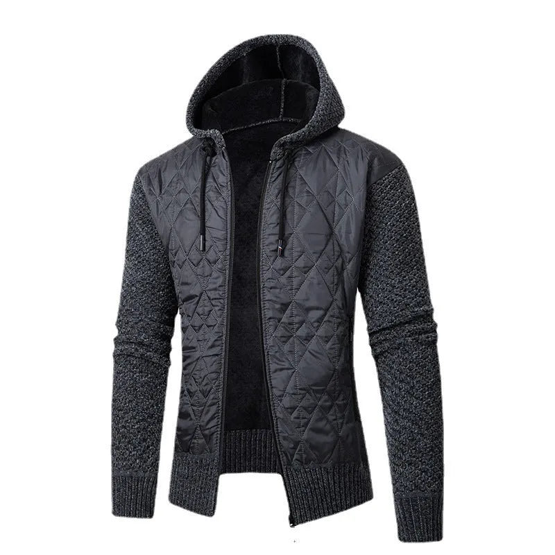Man wearing a grey hooded corduroy sweater coat with a cinched waist, a winter cardigan style.
