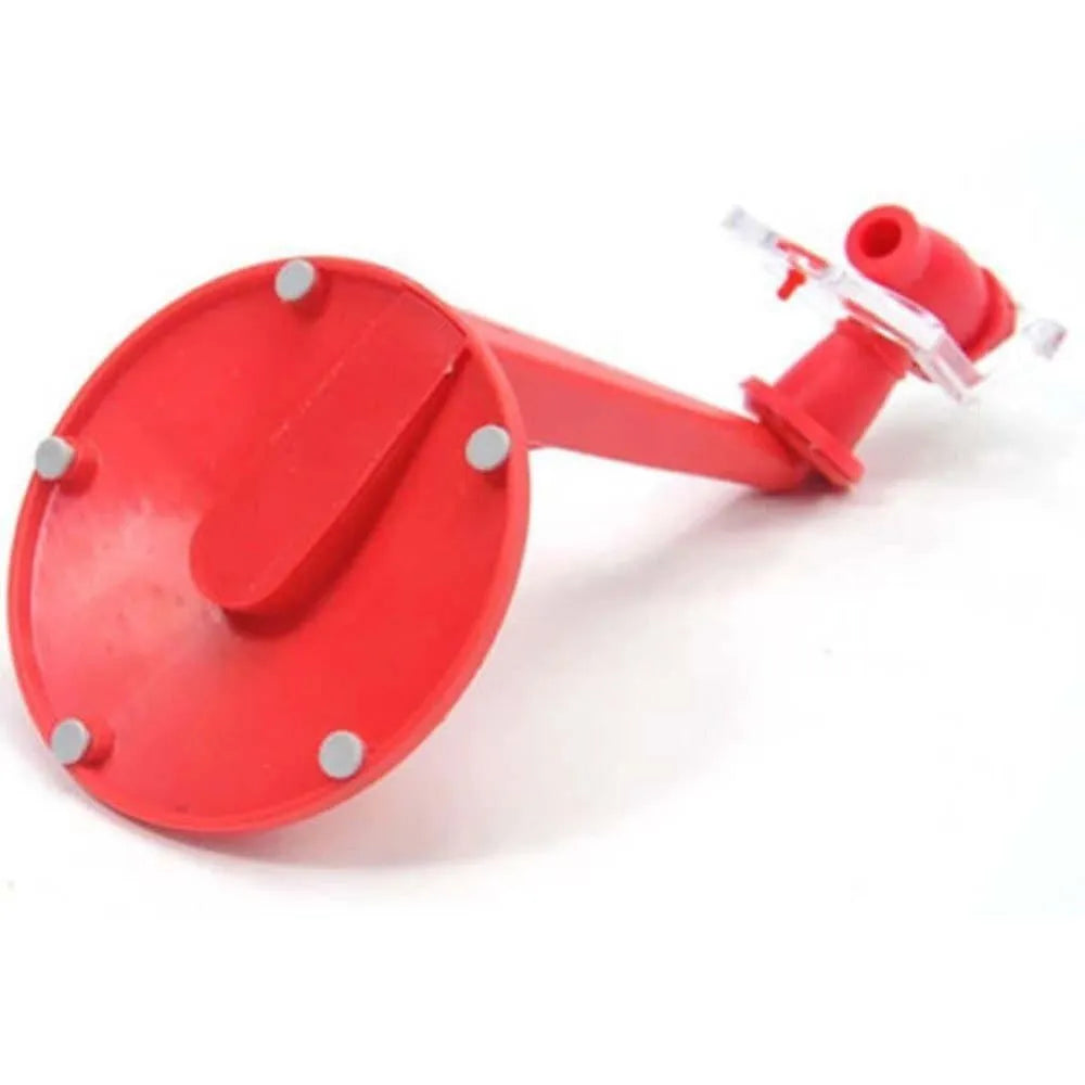 Red plastic Magic Tap soda bottle dispenser attached to a 2-litre bottle.