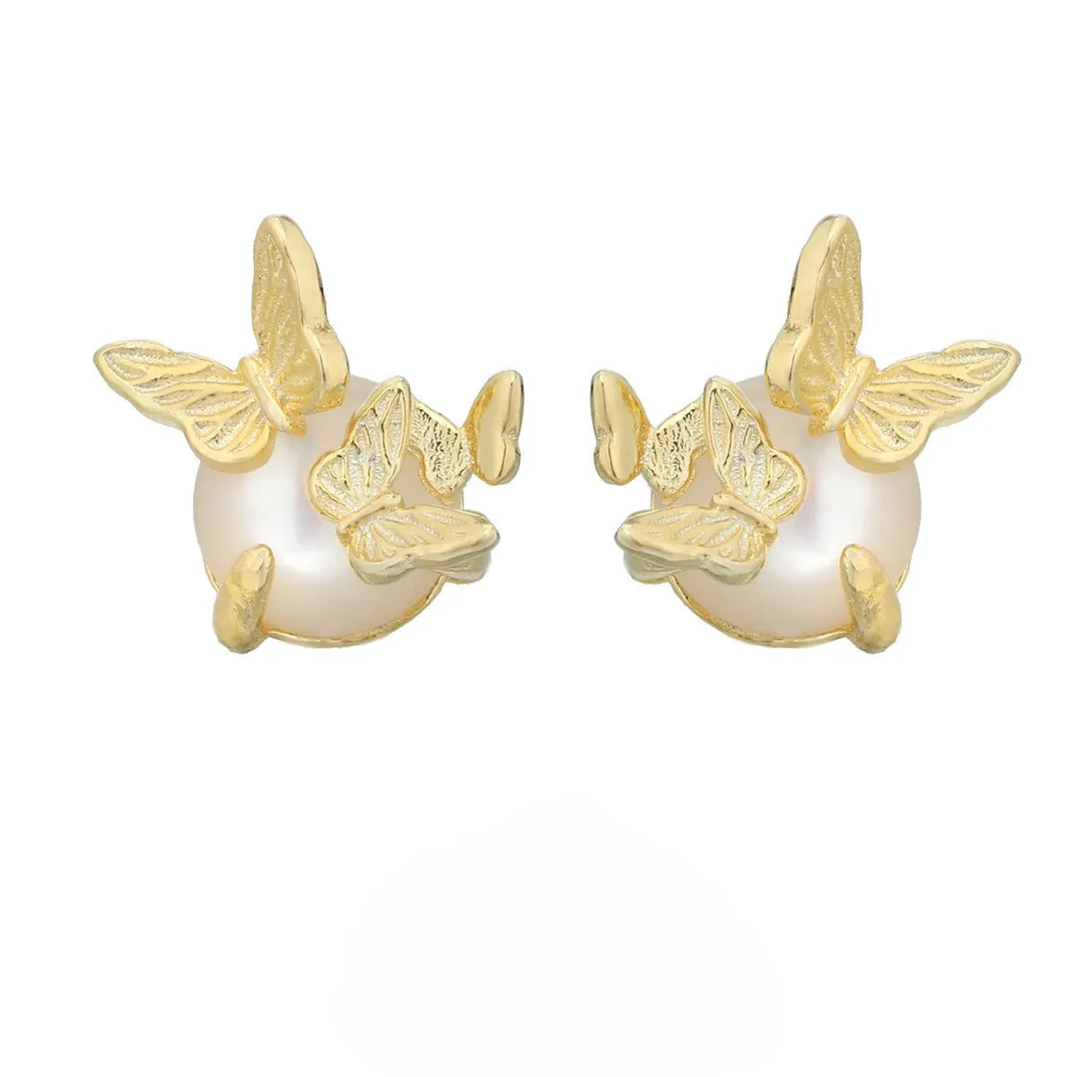 Close-up of 925 silver butterfly stud earrings with animal detail in gold tone finish.