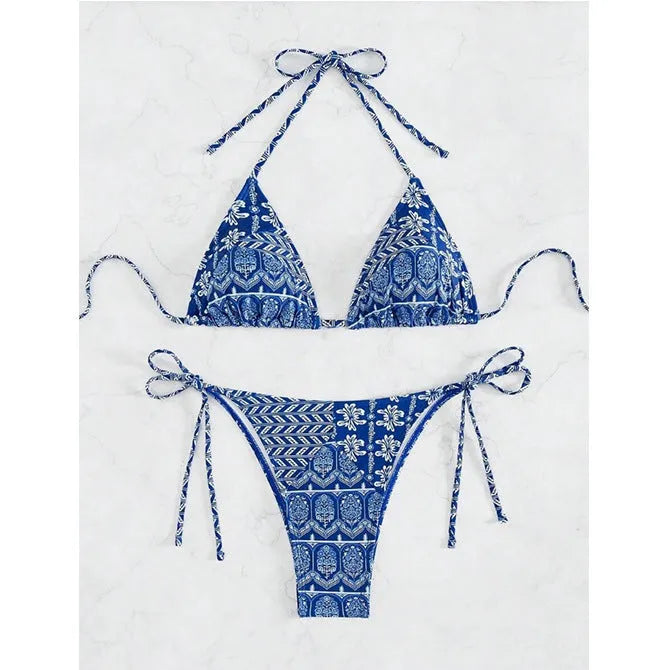 Women's green bandage style bikini with printed stitching on a briefs bottom.