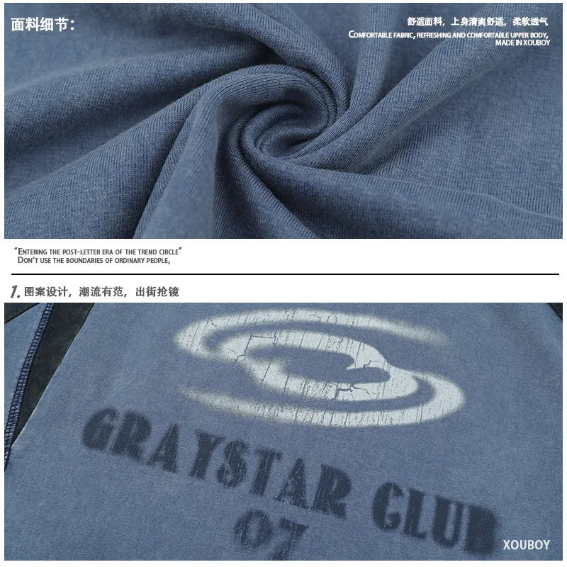 Blue men's hip hop letter print cotton t-shirt with raglan sleeves, laid flat.