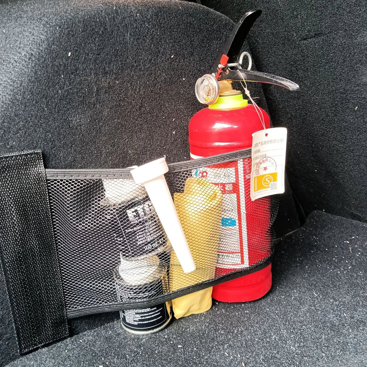 Elastic polyester storage net for car boot organisation in two size options.