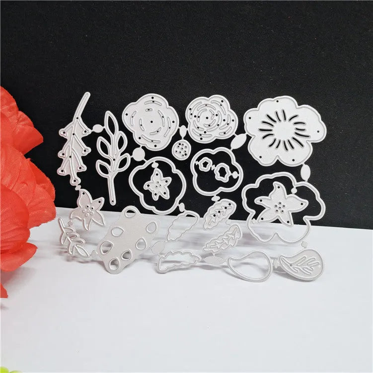 Silver carbon steel flower cutting mould for paper crafts measuring 14.3 by 9.9 centimetres