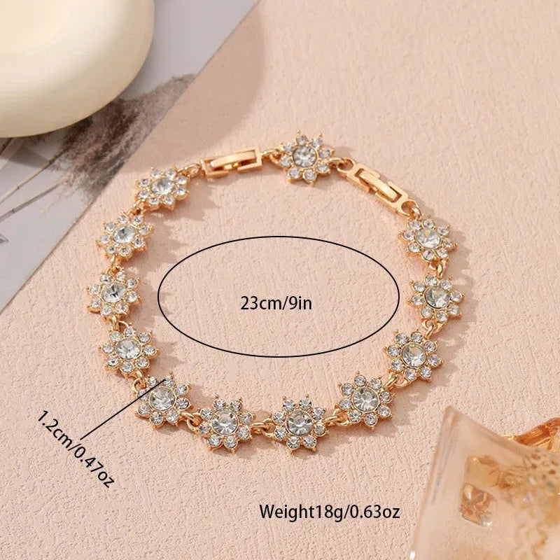 Flower charm bracelet in zinc alloy with electroplated finish and colourful crystal accents