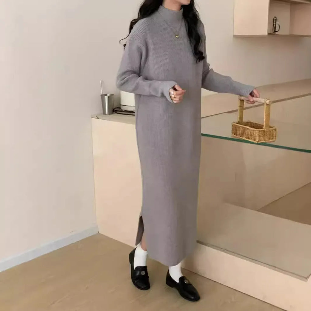 Half turtleneck acrylic knitted dress in midi length with long sleeves and high waist
