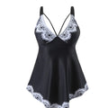 Plus size green two-piece bikini swimsuit with sleeveless top and briefs.
