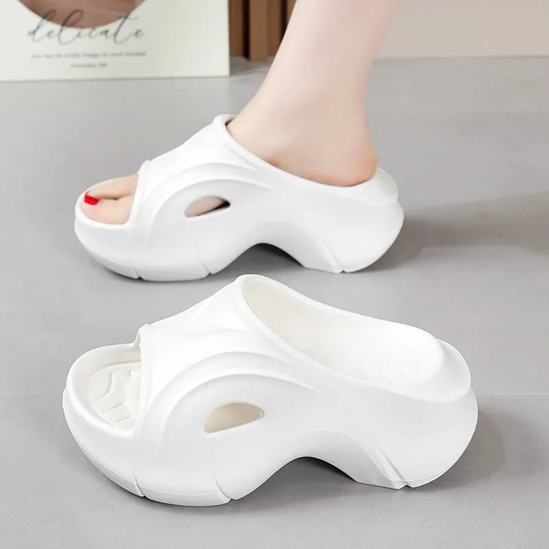 Women's white thick-soled EVA slippers with round toe design for beach use