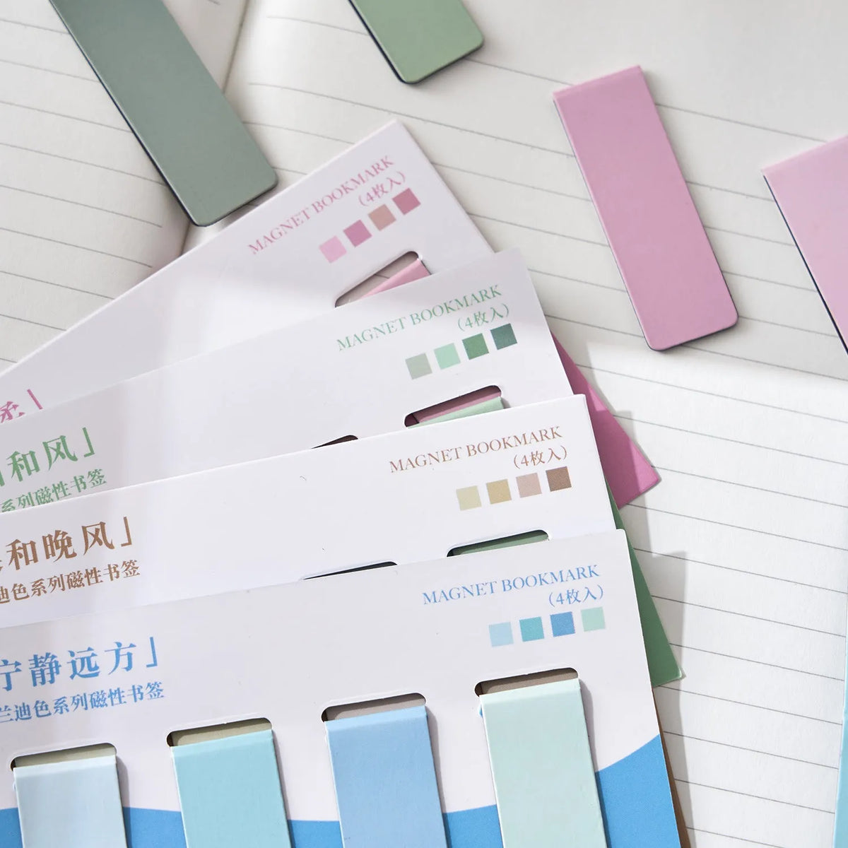 Set of four Morandi colour block magnetic bookmarks showing magnet fastening mechanism