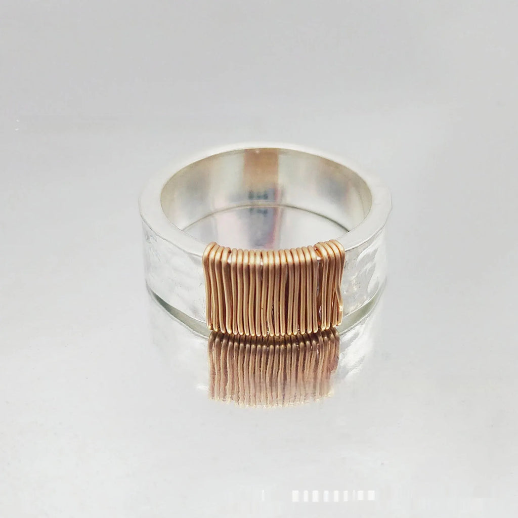 Copper bracelet ring with irregular coil design and electroplated silver-gold finish