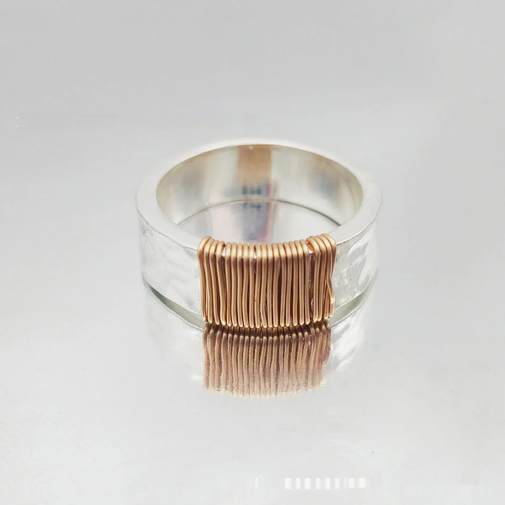Copper bracelet ring with irregular coil design and electroplated silver-gold finish