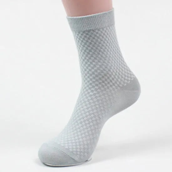 Men's bamboo fibre socks with small square pattern in black, grey, blue, and navy colours