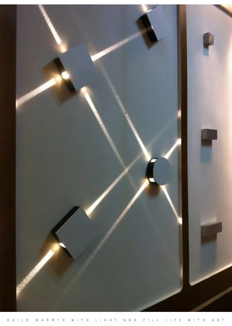 Modern square or round LED aluminium wall light with iron shade showing warm white illumination