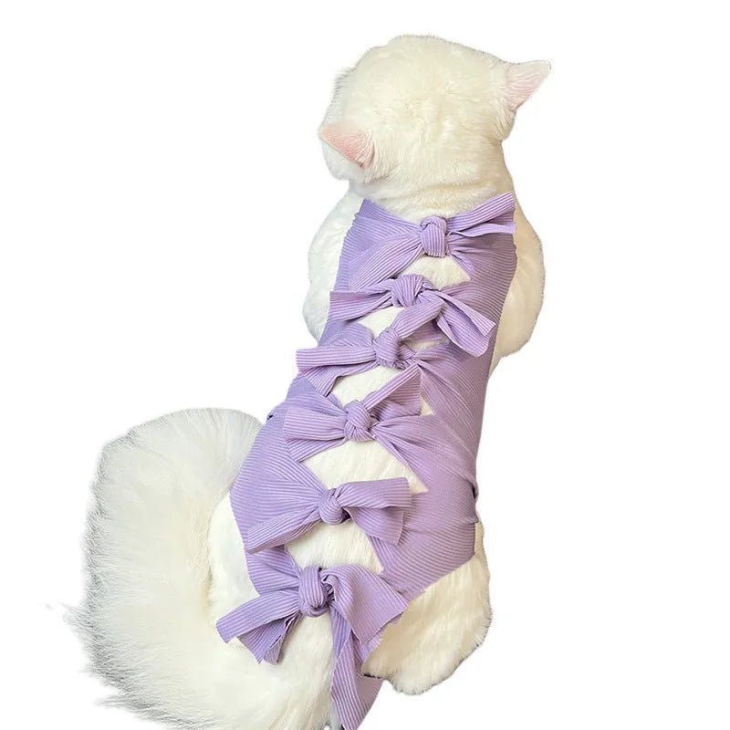 Lace-up polyester cat recovery suit for post-surgery care in blue, shown on a cat mannequin.
