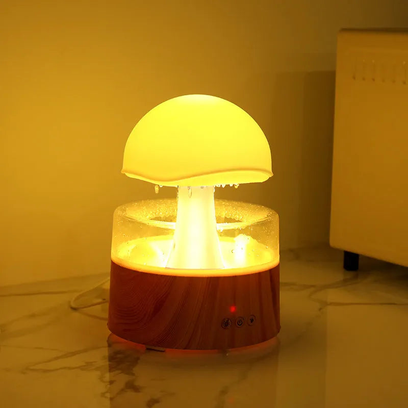 White cloud-shaped humidifier with raindrop simulation and seven-colour lighting, 500ml capacity