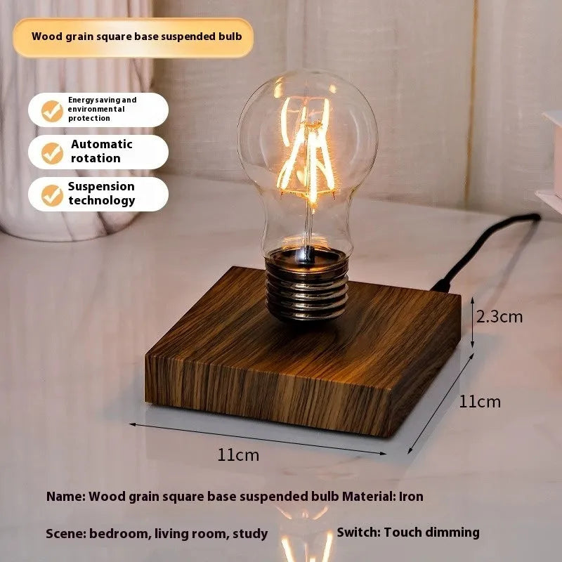 Iron art suspension bulb night lamp with black wood grain square base on desktop