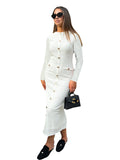French retro slim fit knitted long-sleeved dress in black with button detail.