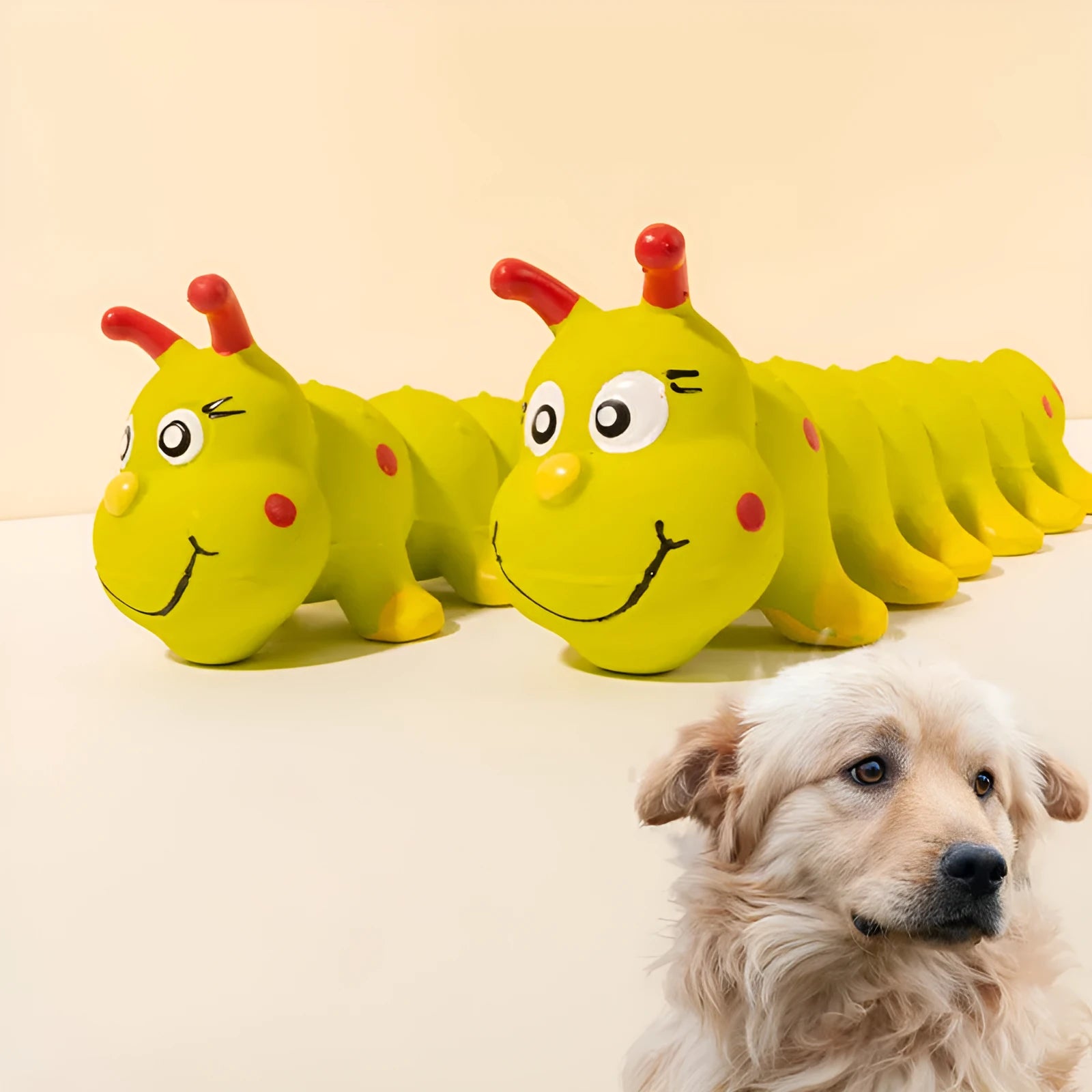 Yellow caterpillar-shaped rubber dog toy with squeaker measuring 25.5 cm