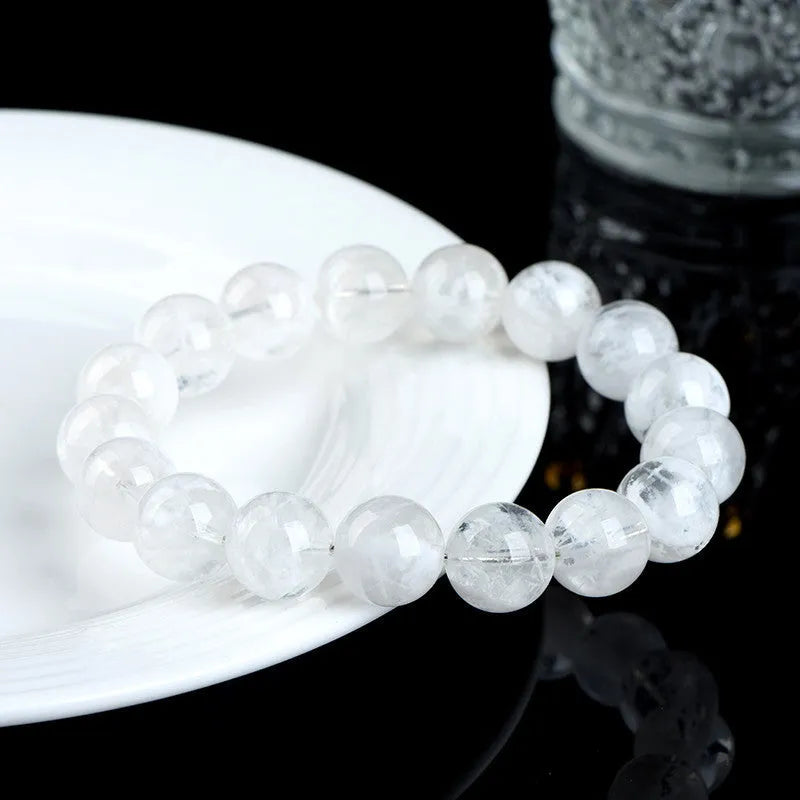 Natural crystal women's bracelet with blizzard snowflake round beads featuring Ruyi and Xiangyun design elements