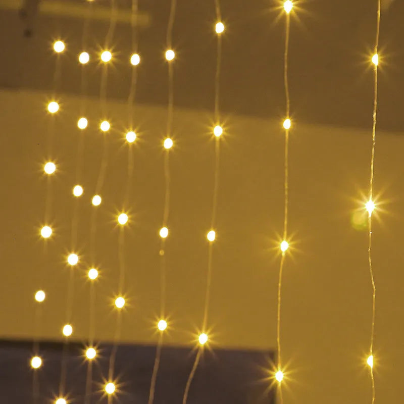 Copper curtain Christmas lights with LED beads in blue colour, showing romantic star lights effect for holiday decoration