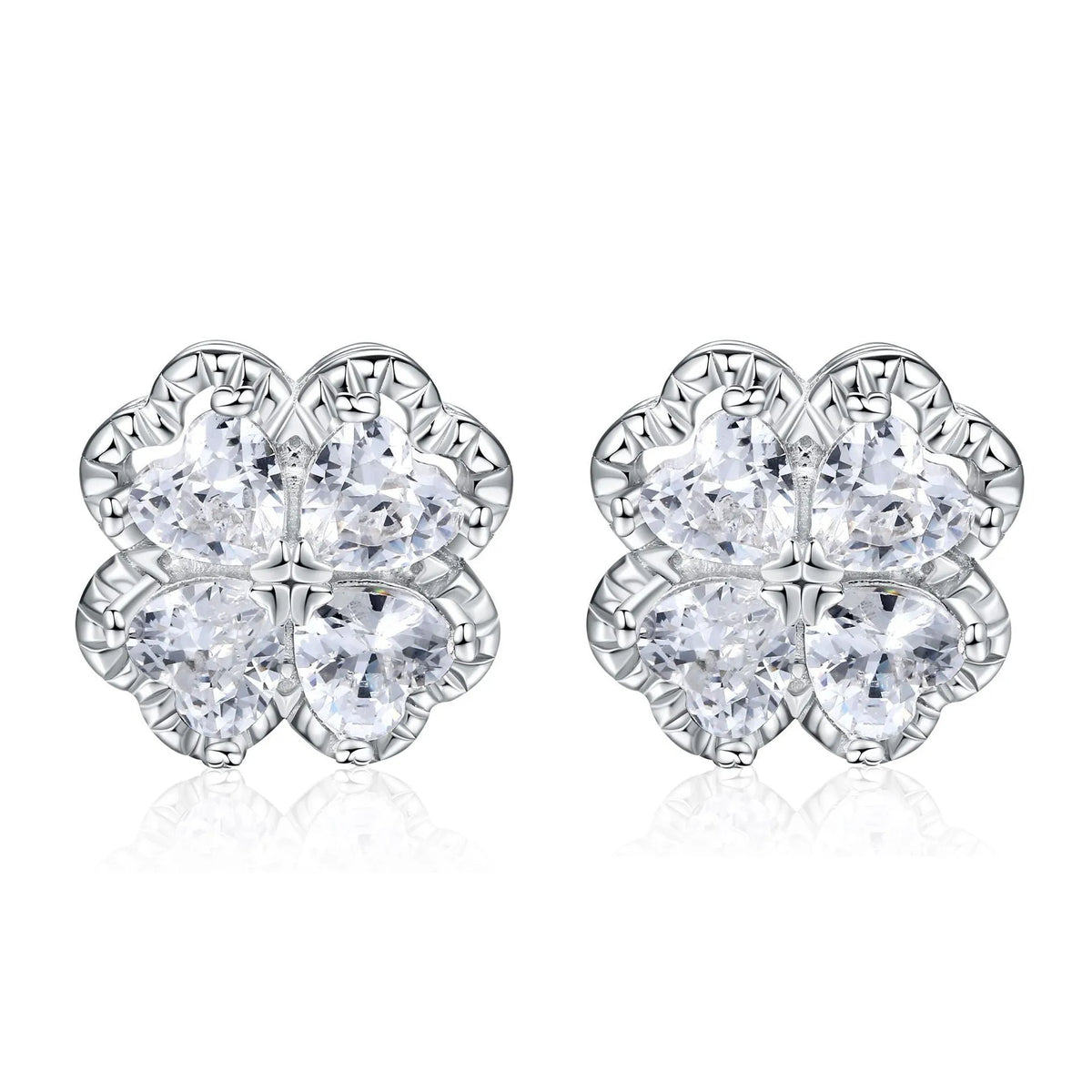 Close-up of women's heart-shaped 925 silver earrings with four-leaf clover zircon inlay, white gold colour finish.