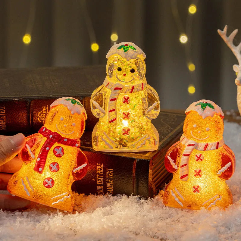 Glowing gingerbread man snowman Christmas ornament with LED lights in plastic construction