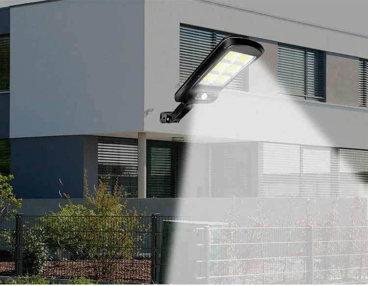 Black solar powered motion sensor street light for outdoor security with PIR sensor