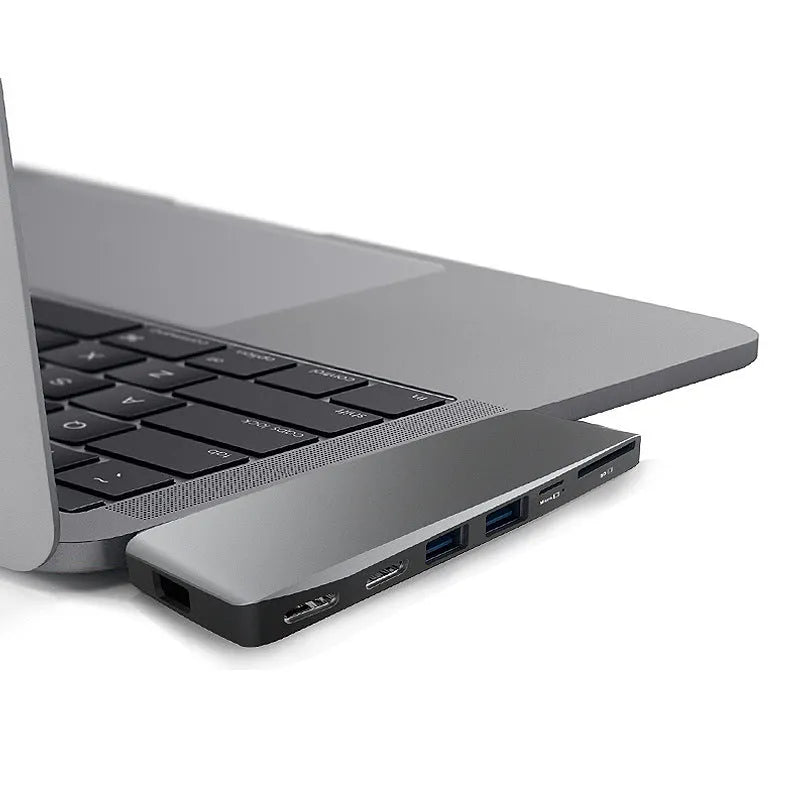 Space grey 8-in-1 USB-C hub for MacBook Pro with dual card readers and HDMI port