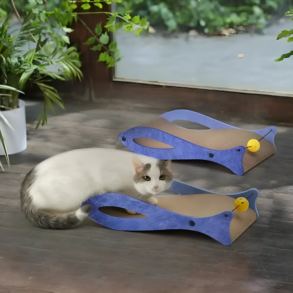 Blue fish-shaped cat scratcher cardboard lounge with bell toy and wavy surface for indoor cats