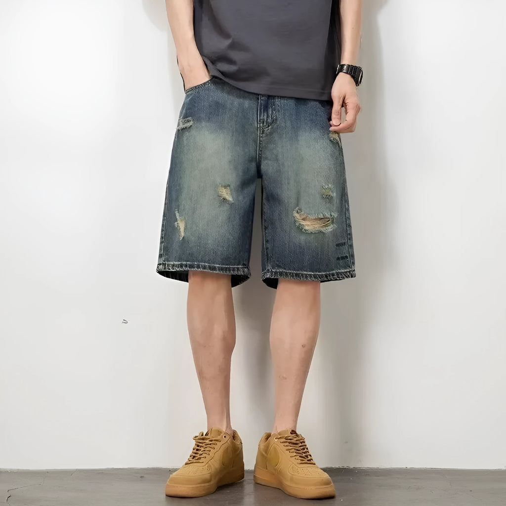 Blue men's denim shorts with a retro loose hole distressed design and a straight-leg cut