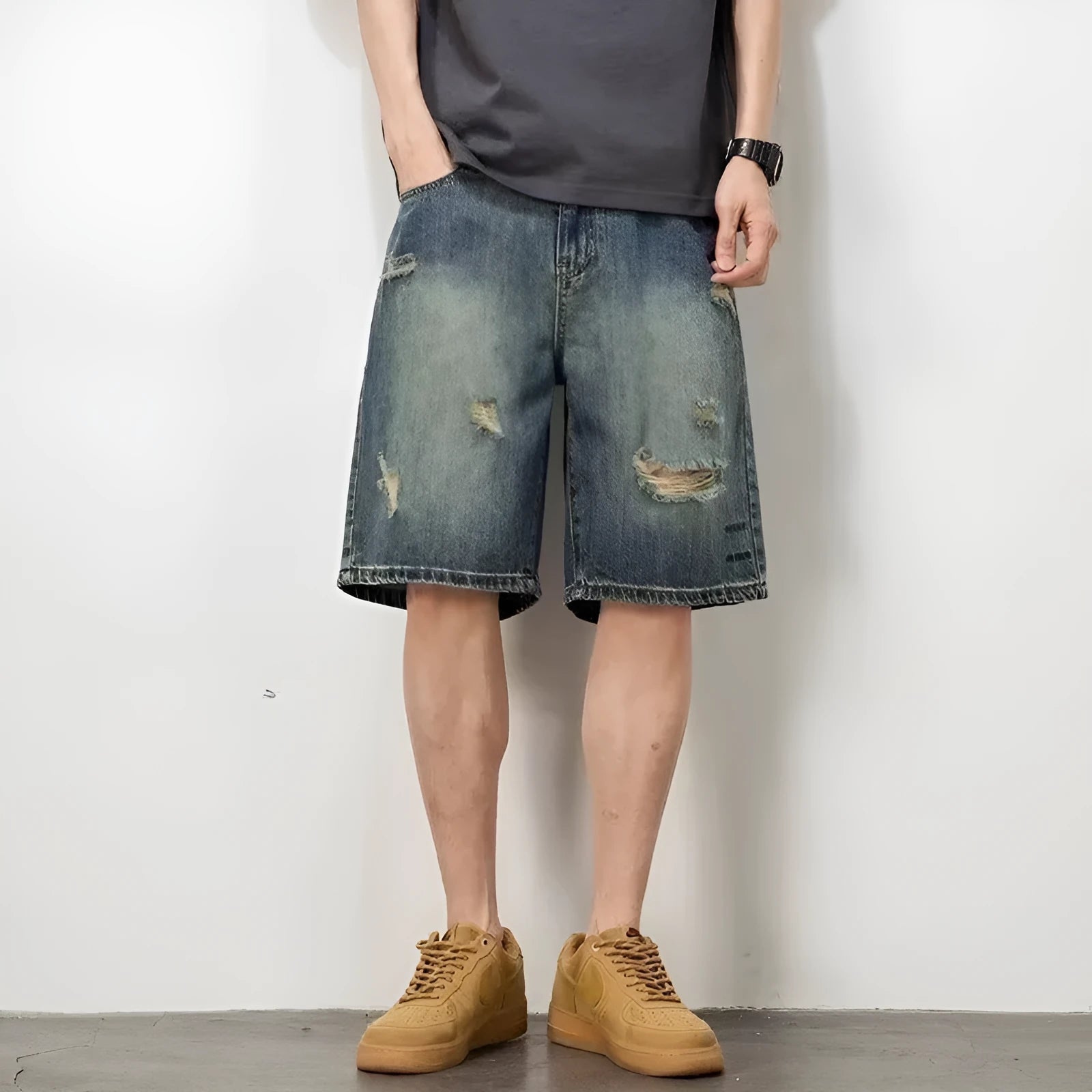 Blue men's denim shorts with a retro loose hole distressed design and a straight-leg cut