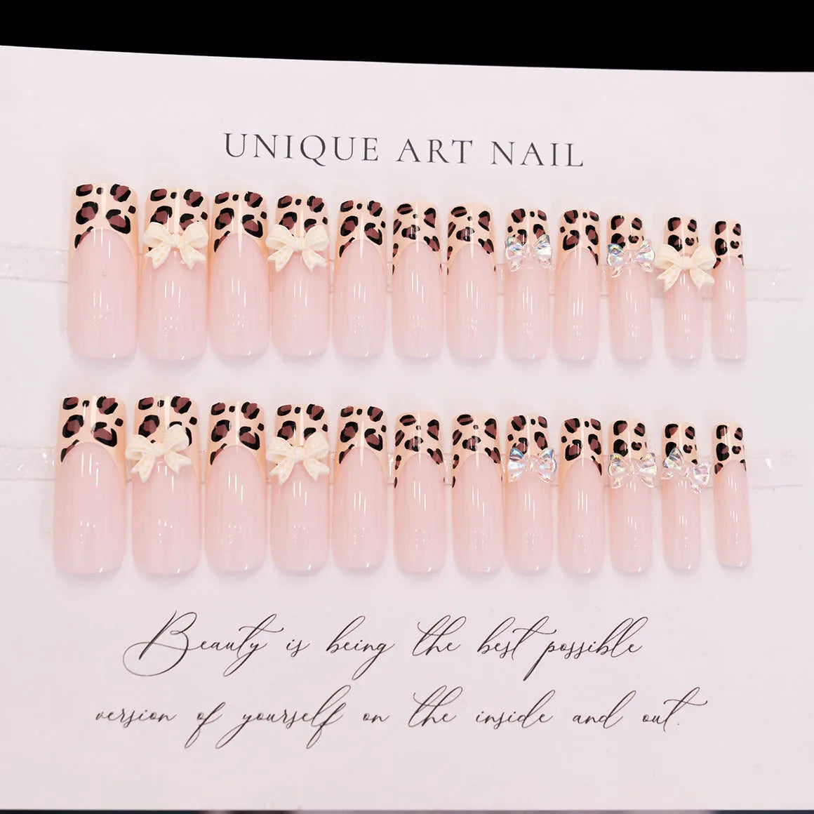 Leopard print butterfly design plastic nail art decorations set on a white background
