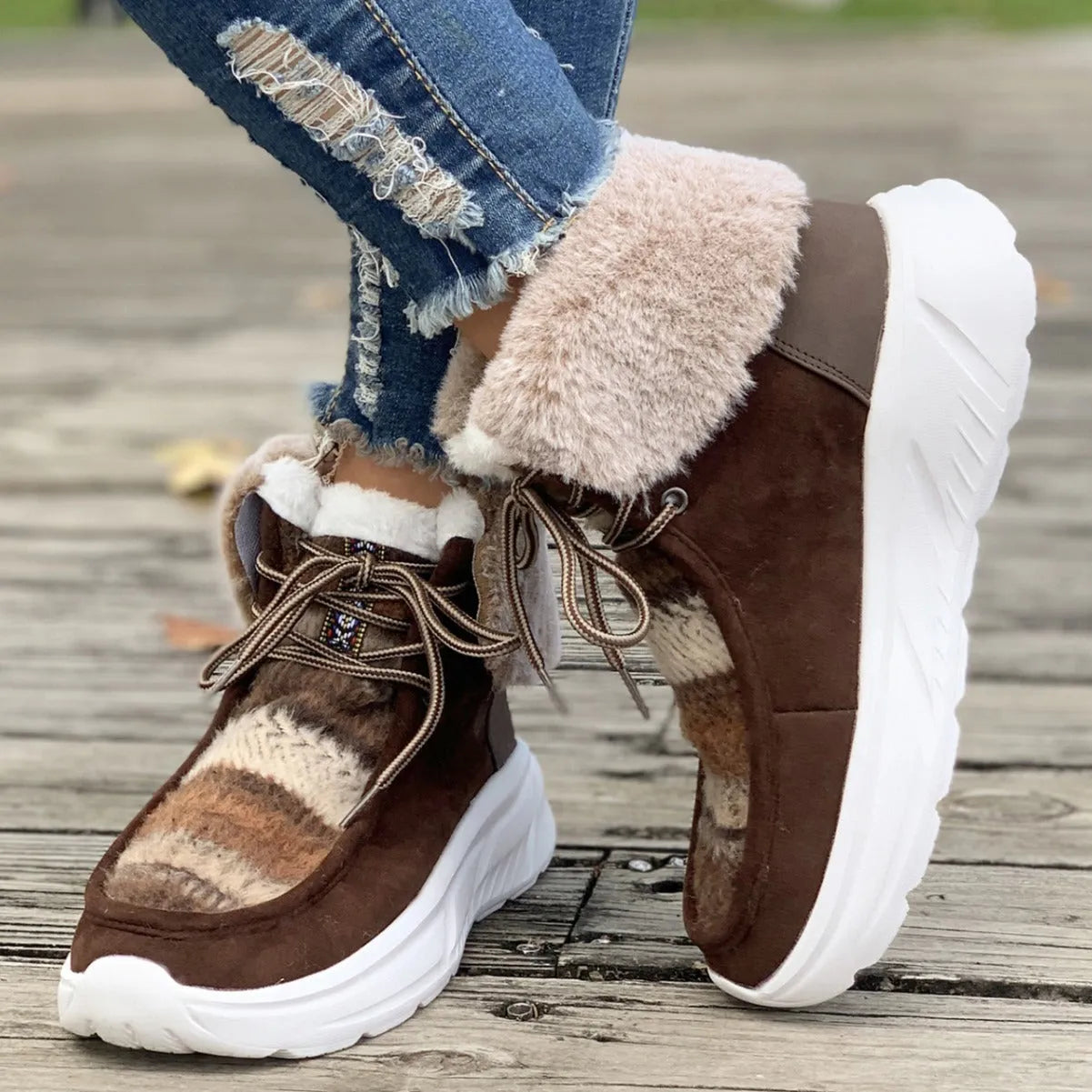 Women's beige lace-up snow boots with suede upper, thick sole, and plush lining