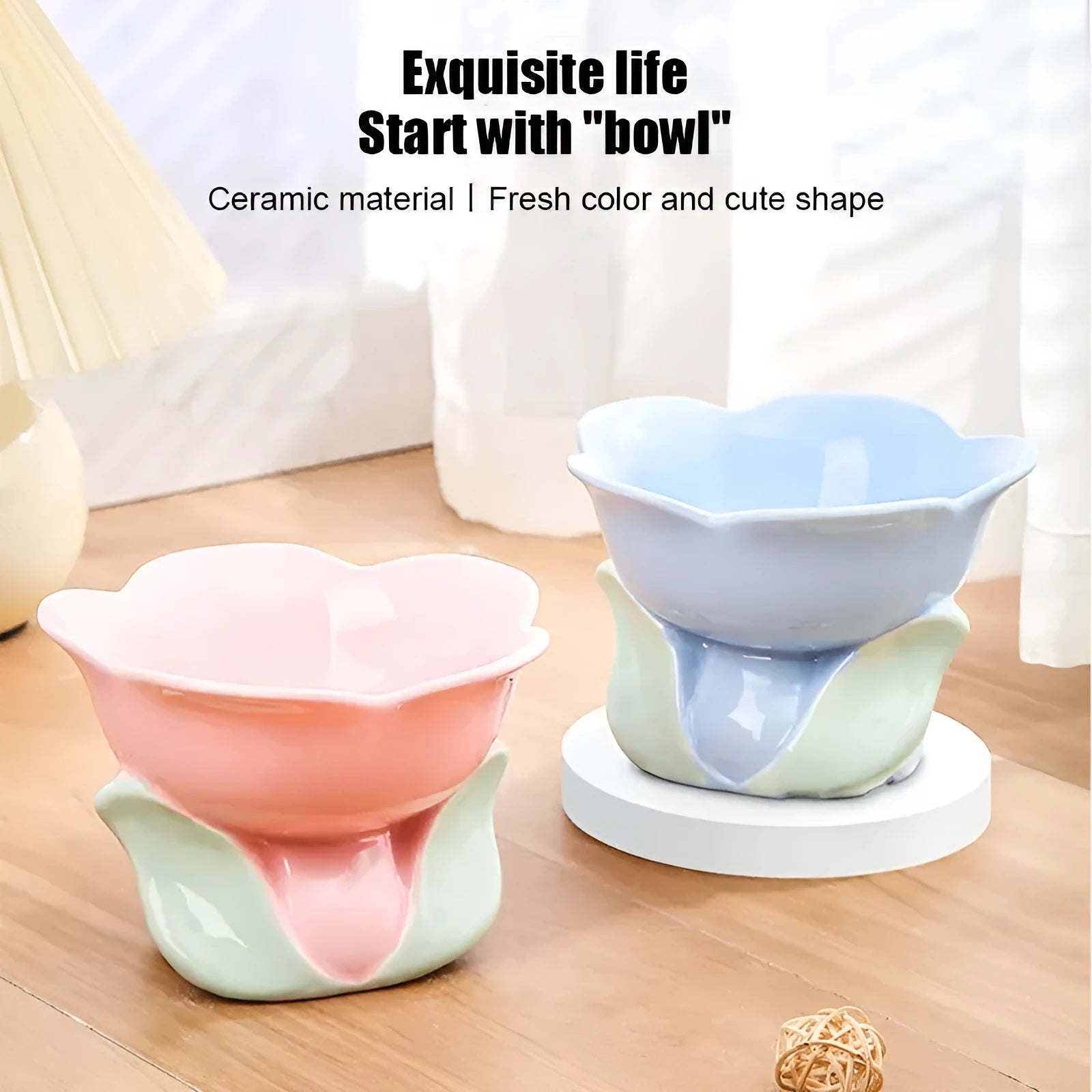 Blue ceramic elevated pet bowl with floral pattern and non-slip base for cats and small dogs.