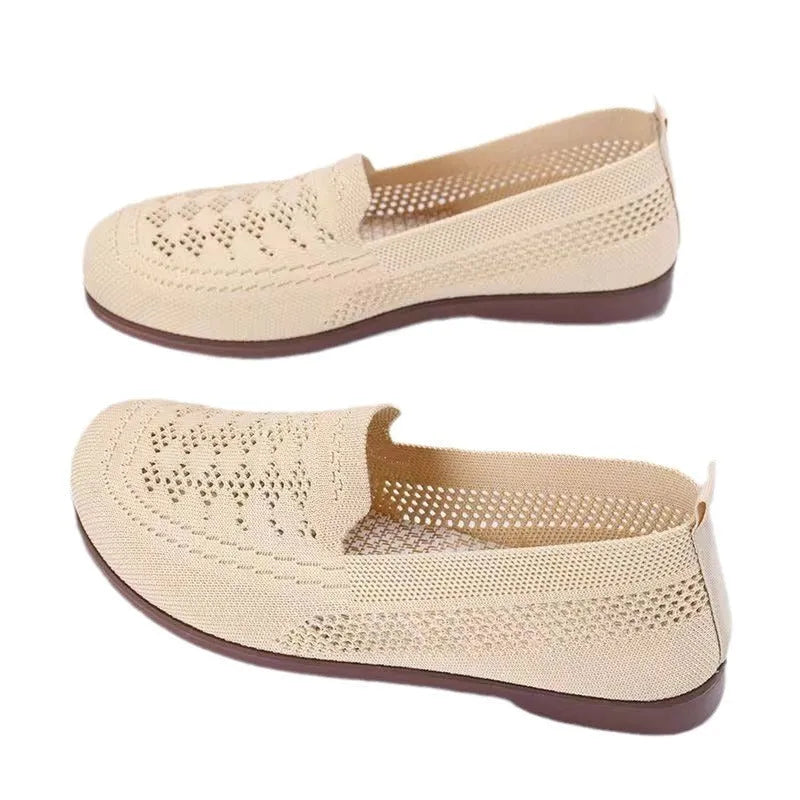 Women's beige low-top tennis shoes with mesh upper and anti-skid sole for wide feet.