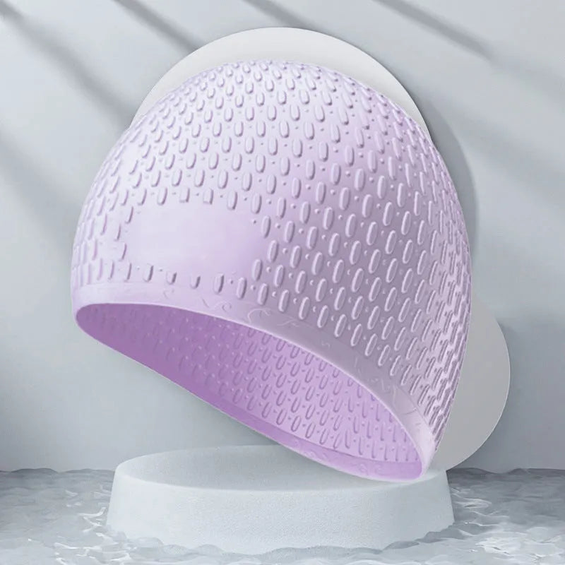 Silicone water drop style swimming cap for adults in various solid colours