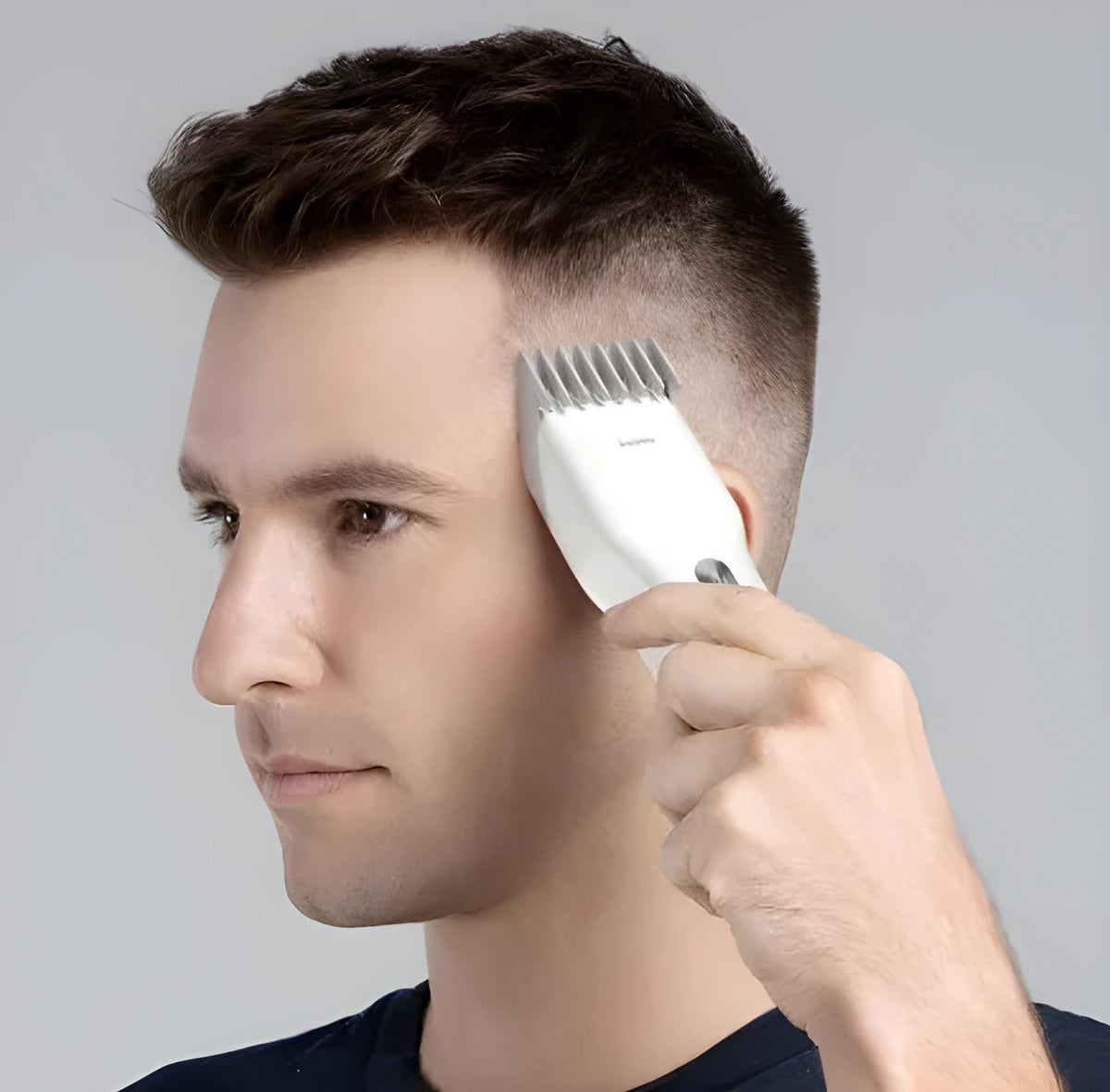 Black cordless electric hair clipper with nano ceramic cutter head and adjustable slider comb for men's grooming