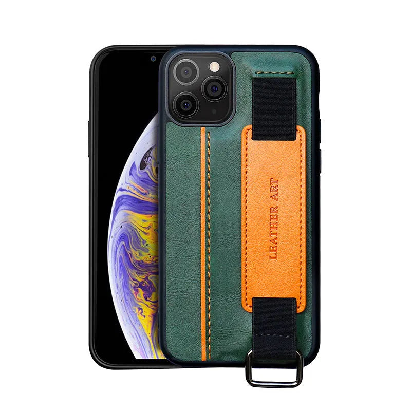 Brown imitation leather iPhone wallet case with a built-in adjustable wrist strap, shown fitted to a phone.