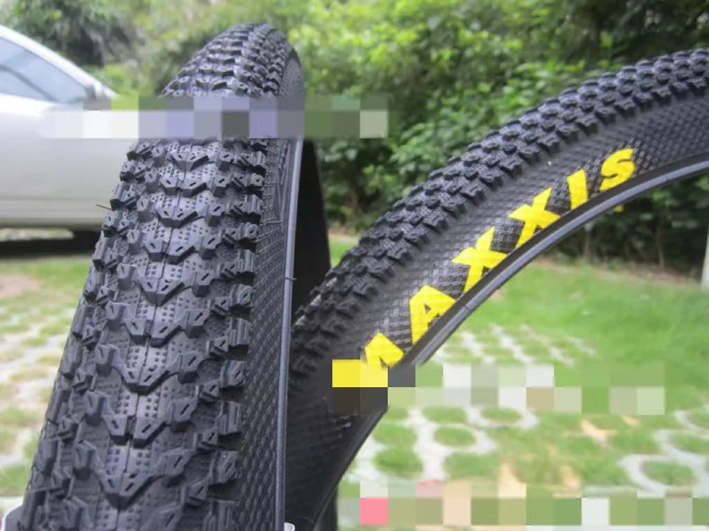 Mountain bike ultralight puncture proof tyre showing tread and white label sidewall option.