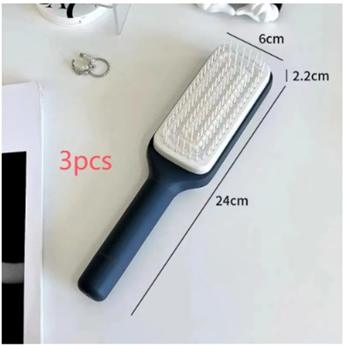 Roland purple self cleaning hair brush with rotating handle and anti-static bristles