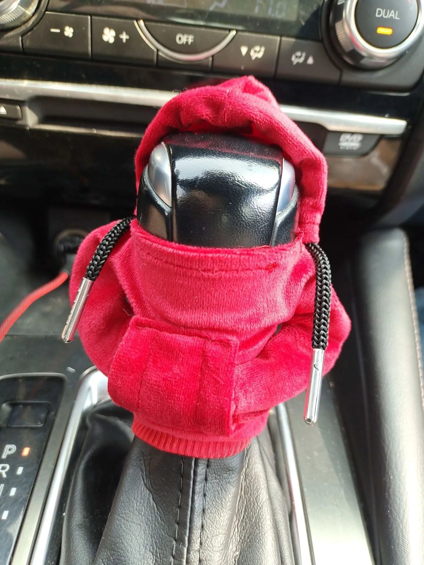 Pure cotton car gear lever sweater decoration in multiple colours on a gear knob.